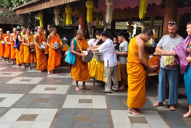 4 highlights: Sticky Waterfall/Elephants/local market /Wat Banden - Sticky Waterfall fun: walking, wet foot massage, and Thai-style play