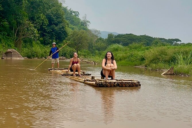 7 Hour Sticky Waterfall and Double Rafting Adventure - Bamboo rafting: calm river time after the rapids