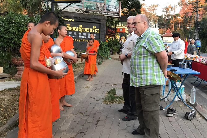 Alms and Wat Phra That Doi Suthep Private Chiang Mai Tour - Warorot Market: Shopping Energy Without the Pressure