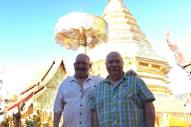 Alms and Wat Phra That Doi Suthep Private Chiang Mai Tour - Wat Phra That Doi Suthep: The Temple, the Views, and the Cable Car Lift