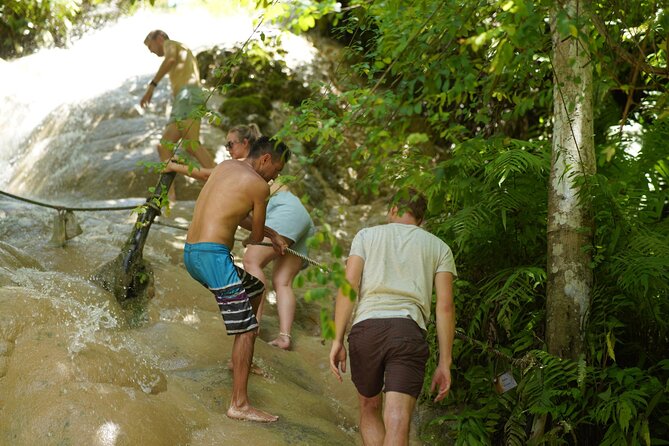 Bua Tong Waterfall Adventure& Huge Cave included Thai Buffet Tour - Nam Phu Chet Si hike: the seven-colors fountain stop that stays peaceful
