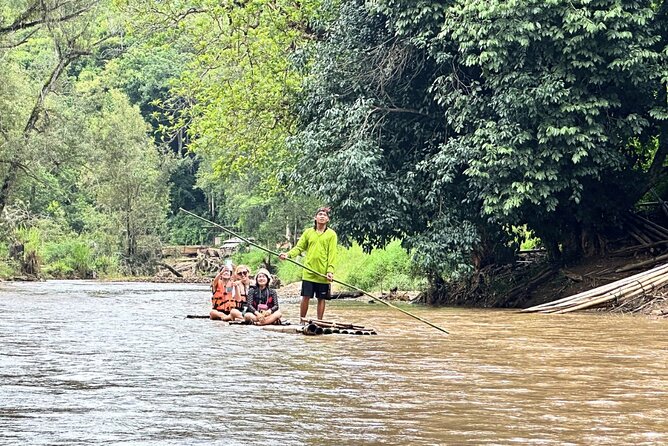 Chiang Mai Adventure ATV Secret Waterfall and Bamboo Rafting - Bamboo rafting on the Wang River, calm flow with a fun finale