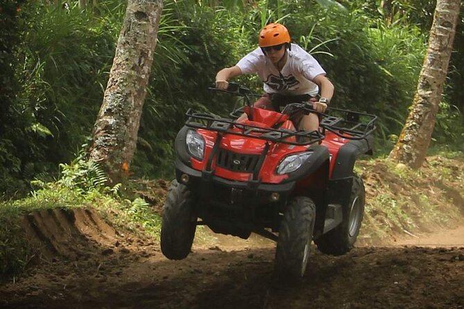 Chiang Mai ATV White Water Rafting and Elephant Sanctuary Full-Day Trip - ATV riding near Bann Kang Kud: rice fields, wildlife, and dust
