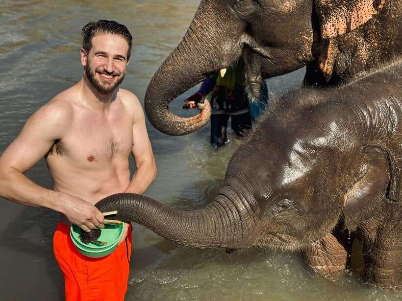 Chiang Mai: Elephant Sanctuary Feeding Program Half-Day Tour - River time: bathing and splashing when the elephants choose