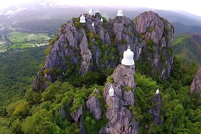 Chiang Mai Exotic Excursion Unseen Miracle of Faith To Pupadang Lampang Temple - Wat Chaloem Phra Kiat: The Buddha Footprint Moment Up on the Hill