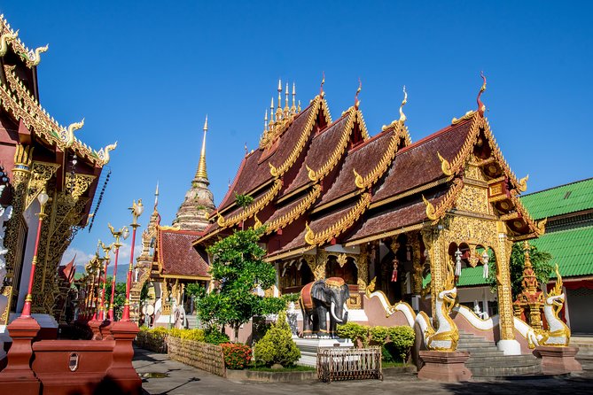 Chiang Mai: Historic Old City Bike Tour - Morning or Night - City Navel Temple (Wat Inthakhin) and the symbolism lesson you feel