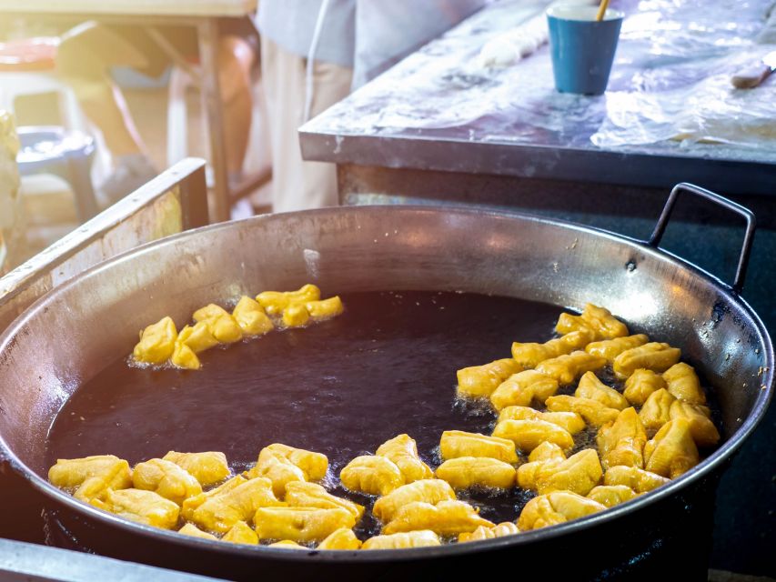 Chiang Mai: Local Food and Markets Guided Walking Tour - Go Neng and pa thong go: the dinosaur-bun moment