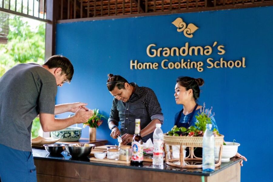 Chiang Mai: Local Northern Thai Cooking Class at Grandma's - Hands-on skills: charcoal grill, vegetable washing, millstone flour, and coconut grating