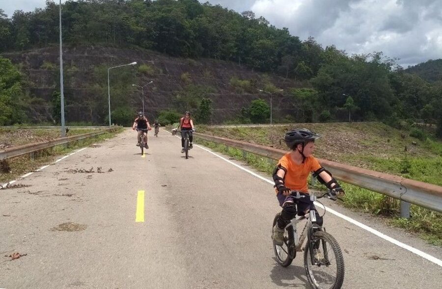 Chiang Mai: Rainforest Guided Mountain Biking Tour - The core experience, rainforest single-track to Mae Kuang Dam views