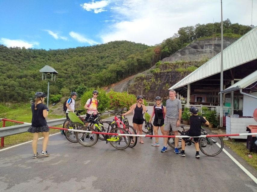 Chiang Mai: Rainforest Guided Mountain Biking Tour - Wat Doi Thaen Phra Pha Luang, photos, water time, and the first big trail push