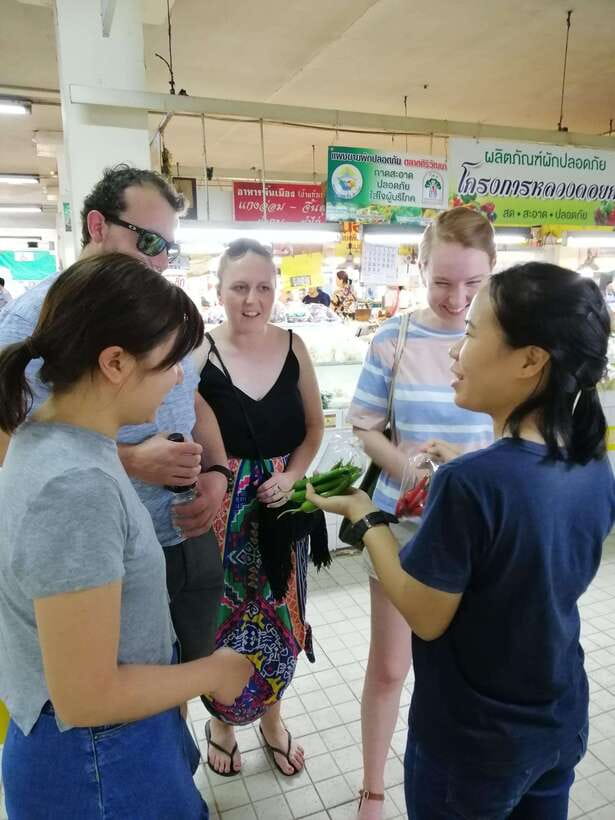 Chiang Mai: Thai Cooking and Market Tour with Lanna Smile - Cooking at your own station, with English instruction