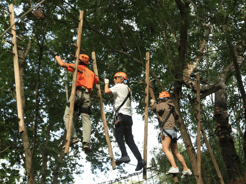 Chiang Mai: Zipline adventure with lunch & city hotel pickup - What you do up in the trees: the obstacle variety that makes it fun