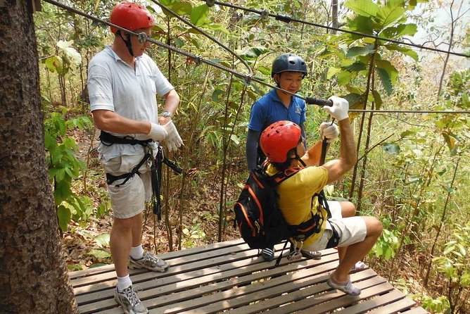 Chiang Mai Zipline White Water Rafting and Elephant Sanctuary - Elephant sanctuary: feeding herbs, watching play, and reading the ethics closely