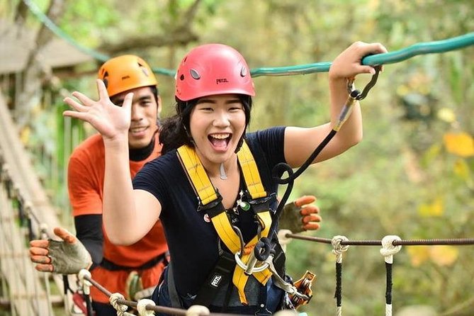 Chiang Mai Zipline White Water Rafting and Elephant Sanctuary - Ziplining across the dam and canopy, with big Chiang Mai views
