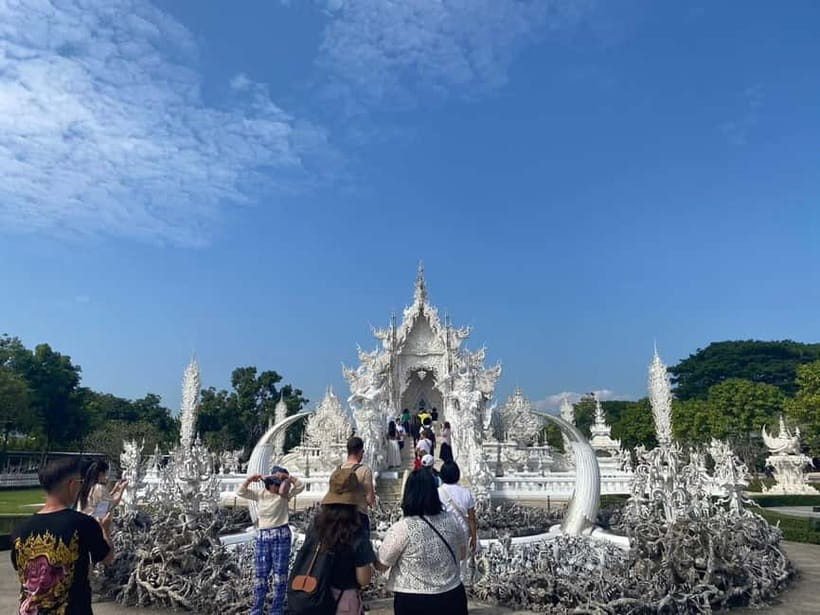 Chiang Rai: 3 Temples, Long Neck Village & Lalitta Café - Blue Temple Wat Rong Suea Ten: Sapphire Color and Naga Guardians