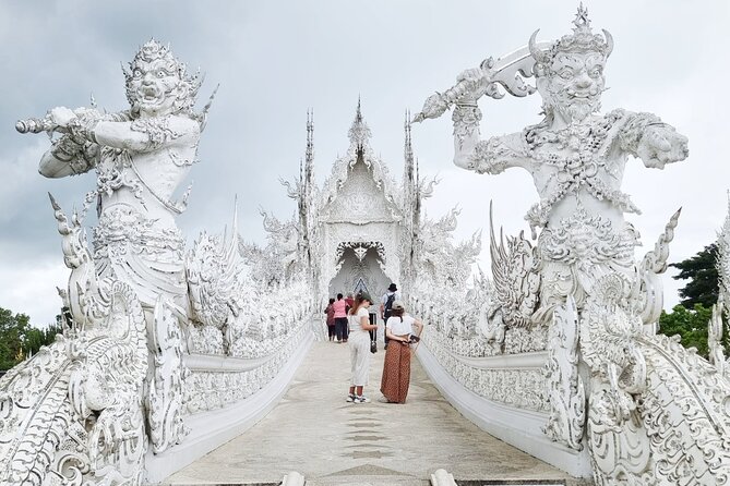 Chiang Rai Famed Temples and Golden Triangle Tour from Chiang Mai - White Temple at Wat Rong Khun: bright, busy, and unforgettable