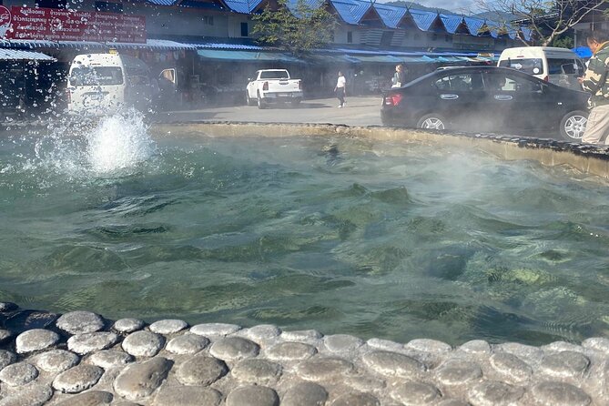 Chiang Rai Tour: Hot Spring,White Temple, Golden Triangle, Yao - Wat Rong Khun (White Temple): glass details, bright surfaces, and lots to stare at