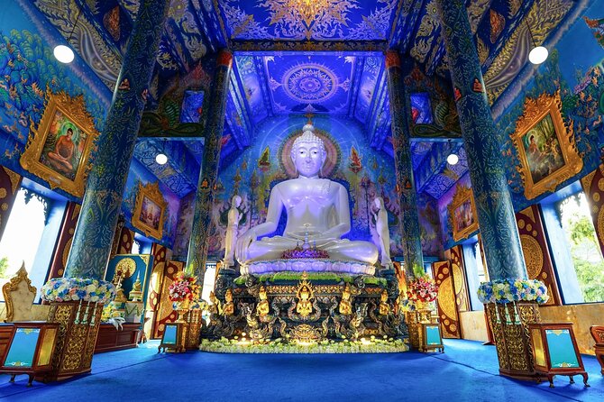 Chiang Rai White Temple, Blue Temple and more from Chiang Mai - Wat Huay Pla Kang (Red Temple complex): the 9-tier pagoda and Guan Yin scale