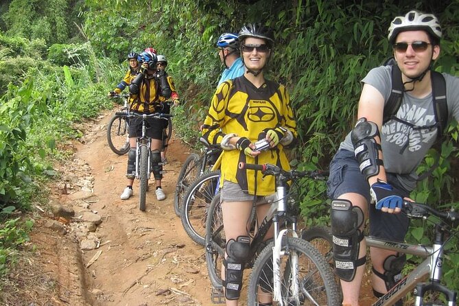 Doi Suthep National Park To Chiang Mai Beginner Downhill Mountain Biking - Stop at Doi Suthep: Views, Park Atmosphere, and Learning the Bike