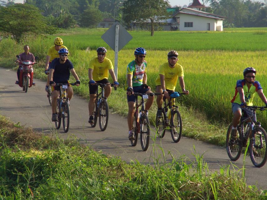 From Chiang Mai: Mae Taeng Valley and Waterfalls Cycle Tour - Guides and group vibe: small team, flexible pacing