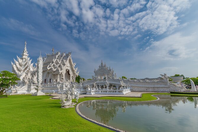 Full Day Chiang Rai 3 Temples White, Blue,Big Bhudha Temples - Wat Rong Suea Ten, the Blue Temple with murals and a donation detail