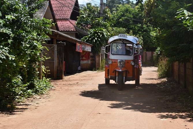 Full-Day Guided Tuk Tuk Chiang Mai Adventure and Rafting - Bamboo rafting down the river, plus how to pack for wet hours