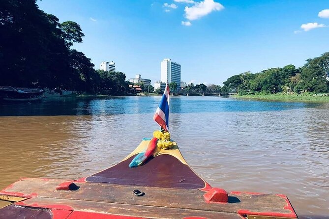 Half Day Private Chiang Mai Trishaw Ride and Mae Ping River Cruise - Wat Phra Singh Temple: one sacred image and a meaningful end