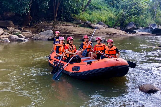 Khampan Rafting: White Water Rafting Guided Adventure in Chiang Mai - Phachee waterfall stop: swim, jump, and slide time