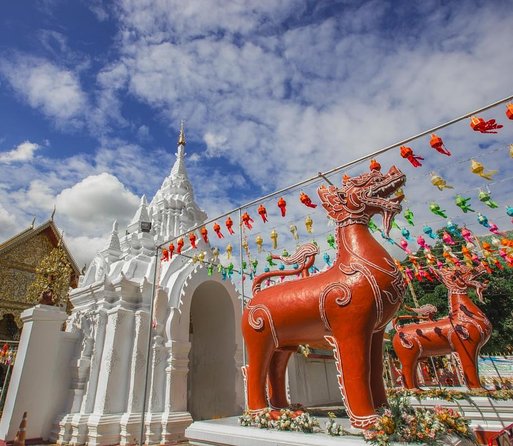 Lamphun and Lampang City Temples Small Group Tour – Full Day - Stop 1: Wat Chamthewi (Wat Ku Kut), a square chedi with 60 Buddha statues