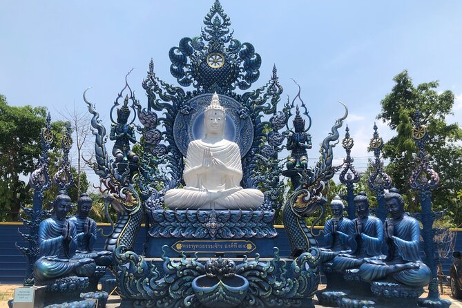 One Day Tour Chiang Rai(White Temple , Blue Temple, Black House) Private Tour - Stop 3: Wat Rong Seur Ten (Blue Temple), blue interior and a still-developing site