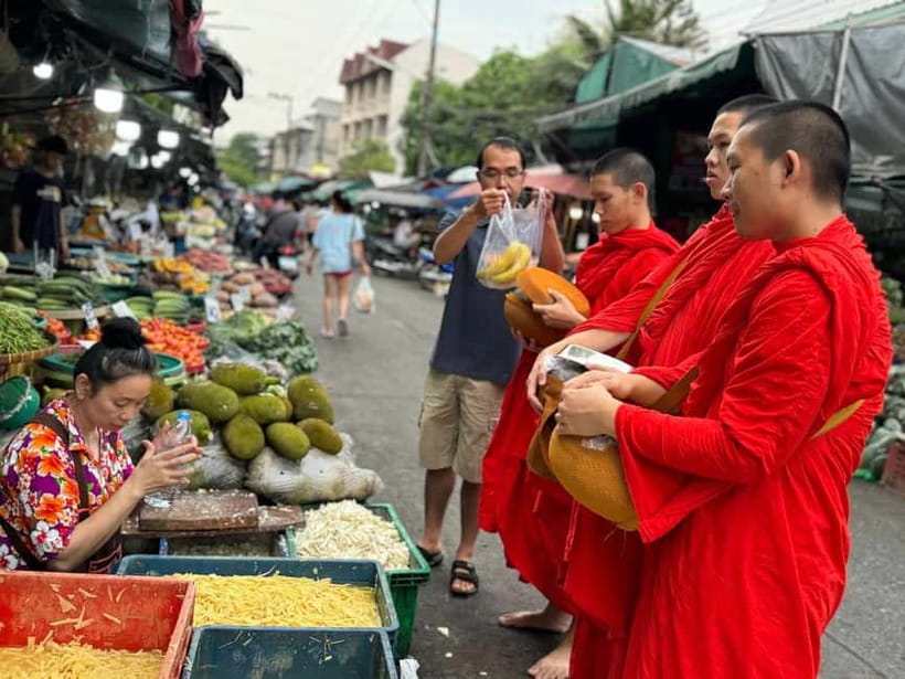 Walk With Monks Collecting Alms(meeting point maybe change) - The Mueang Mai Market segment: food, offerings, and local rhythm
